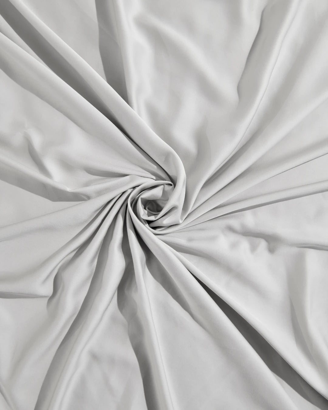 Close-up of gray fabric with folds