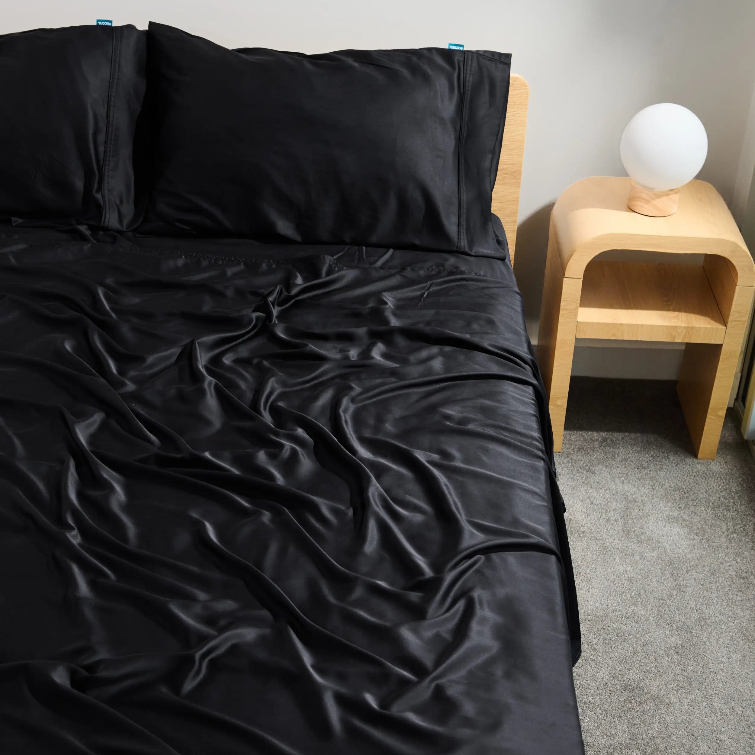Black bamboo bed sheets by Eucora, designed for cool, breathable sleep and a luxurious, contemporary bedroom look.