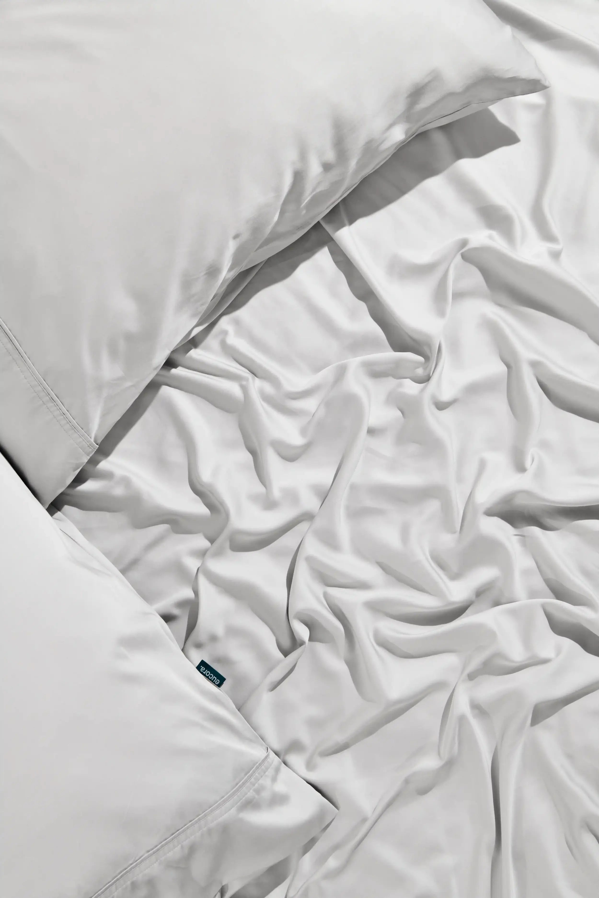 Our black bamboo sheets are more than a colour choice — they’re a statement in comfort. Infused with eucalyptus and woven from breathable bamboo, this fabric feels cool, silky, and ultra-gentle on skin.
For those who like their sleep deep, their style bold, and their bedding effortless.

Wake up in luxury. Wrapped in midnight.
